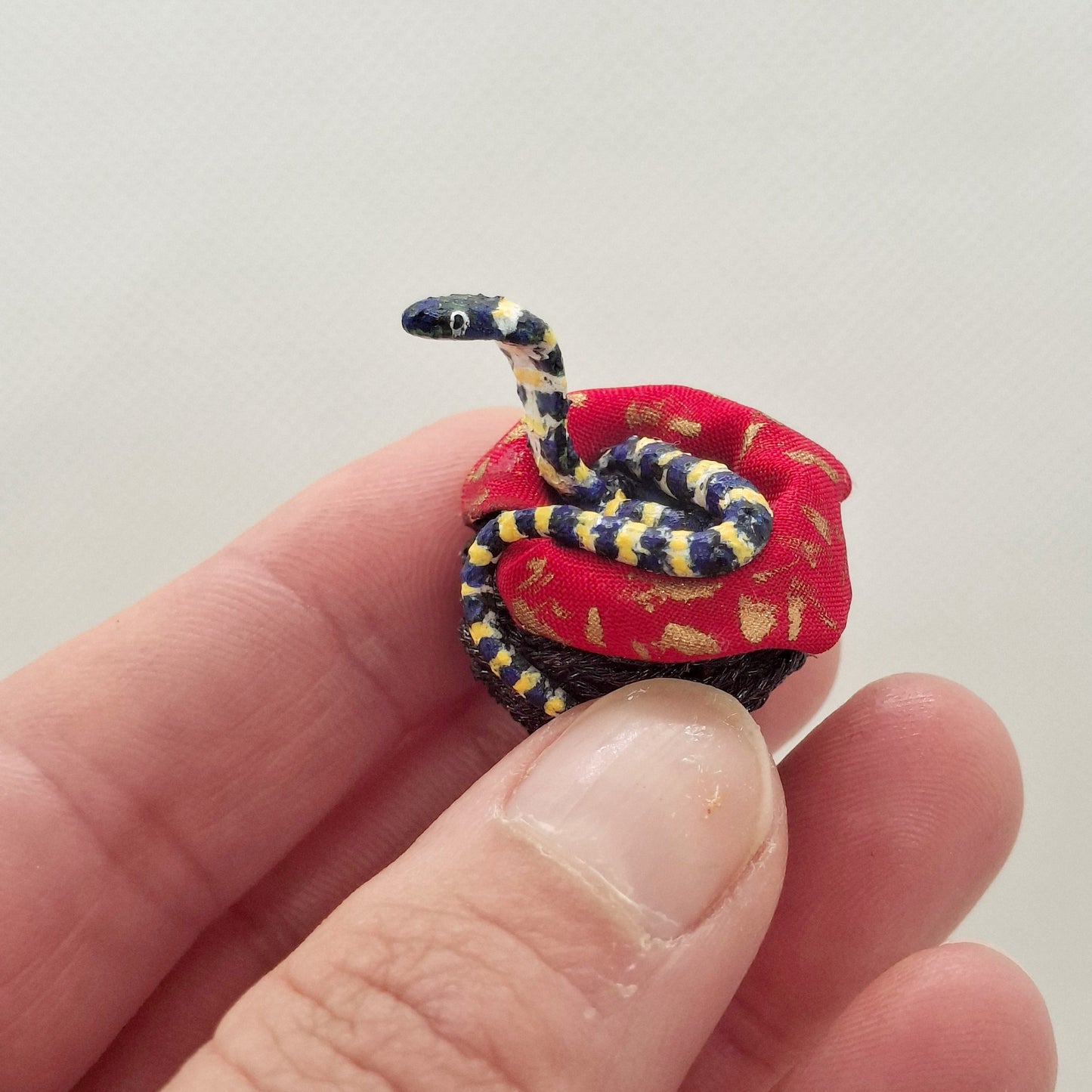 Cobra in Hand Woven Basket