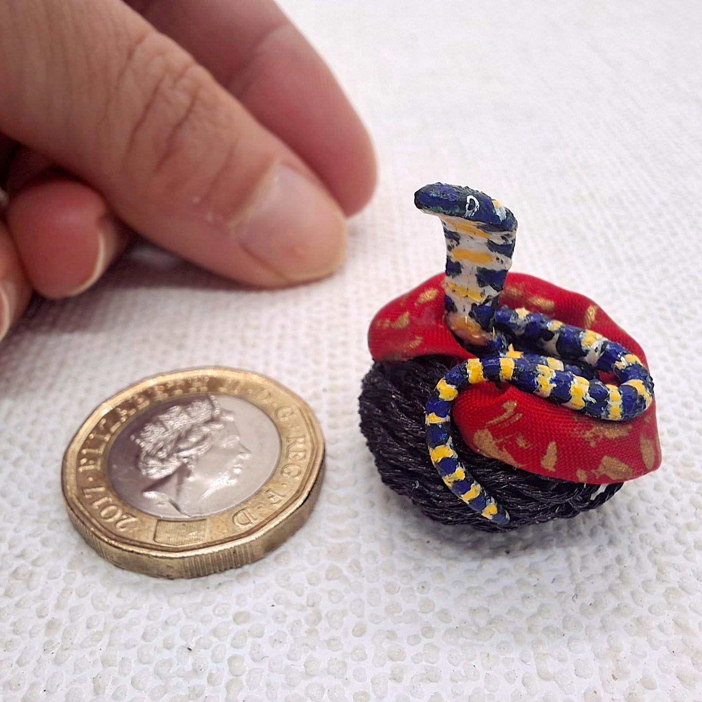 Cobra in Hand Woven Basket