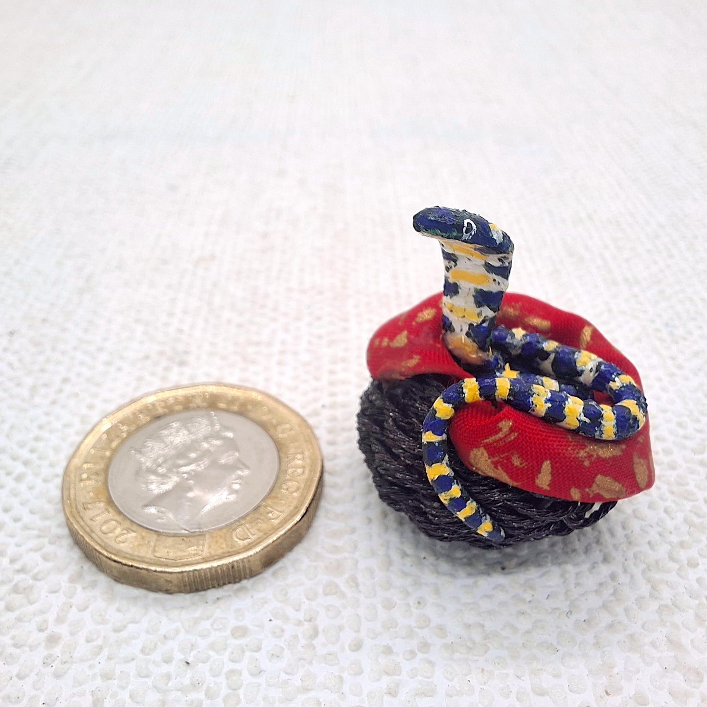 Cobra in Hand Woven Basket