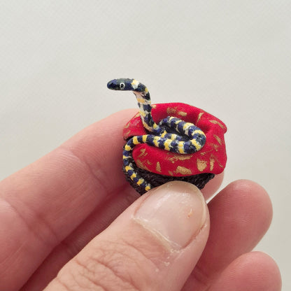 Cobra in Hand Woven Basket